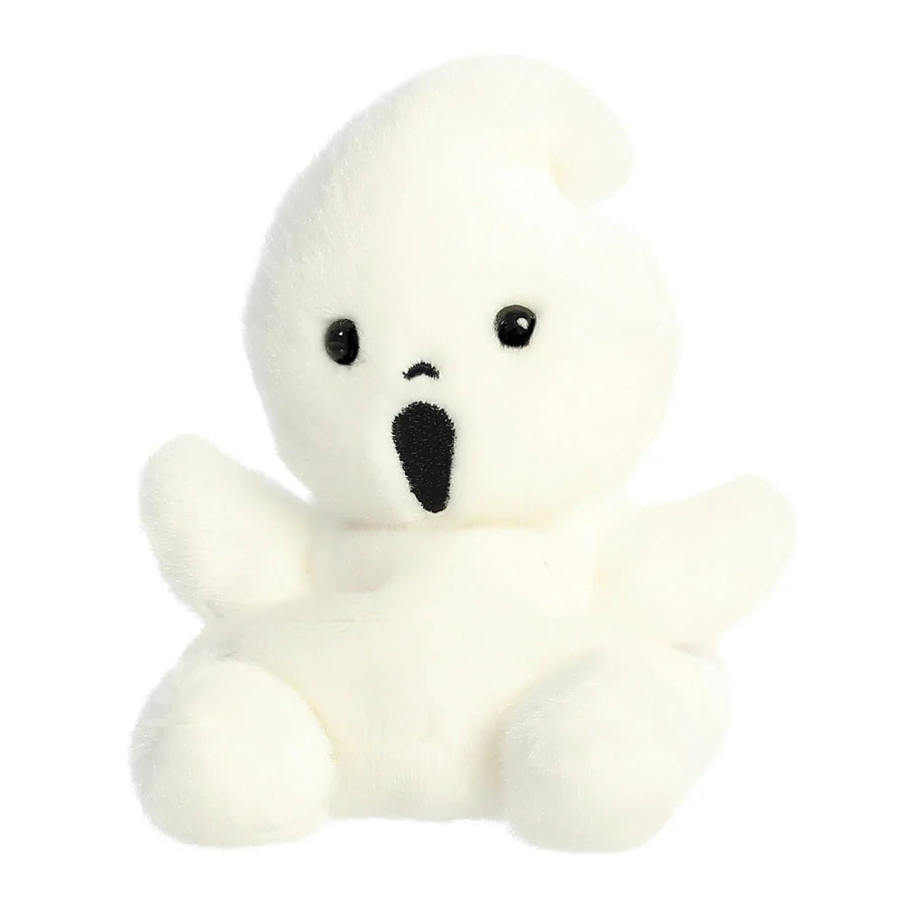 White plush toy with black eyes and nose on a white background