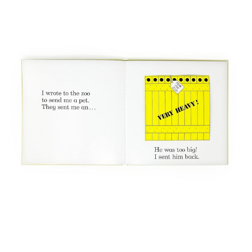 Book open to a page with text and a yellow label on a white background