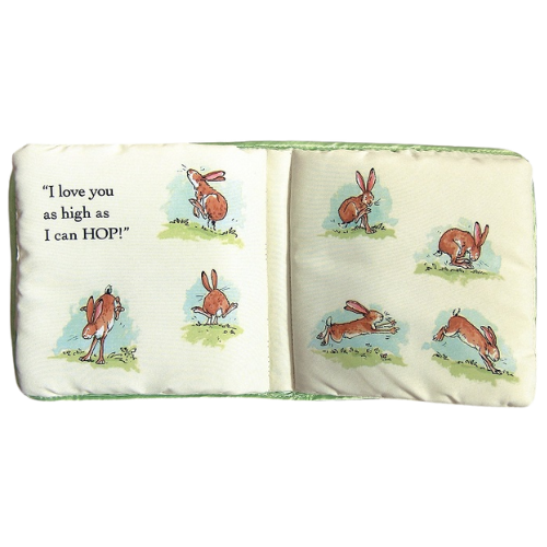 Pillow with cartoon bunnies and text on a white background