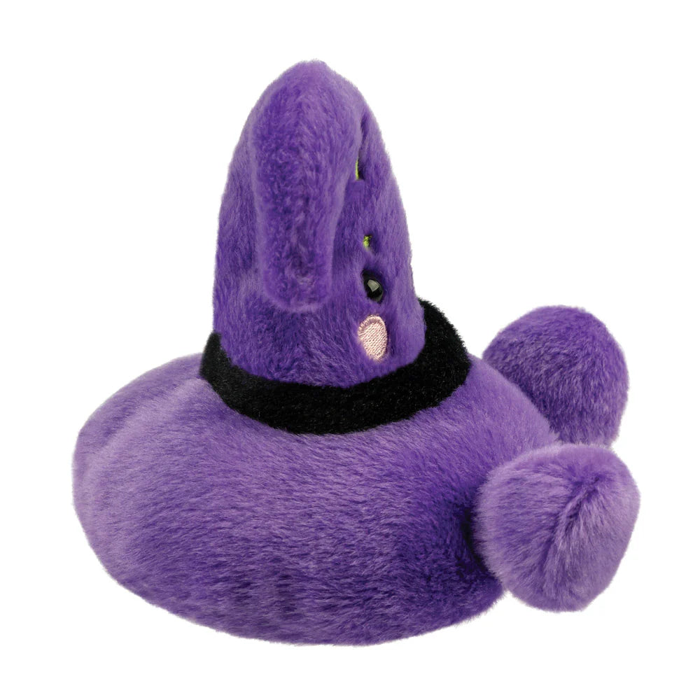 Purple plush toy with a witch hat on a white background