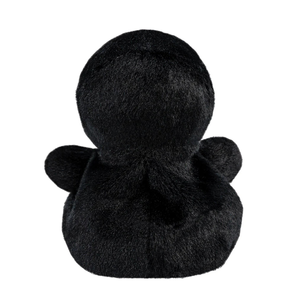 Black plush toy with a round body and small wings on a white background