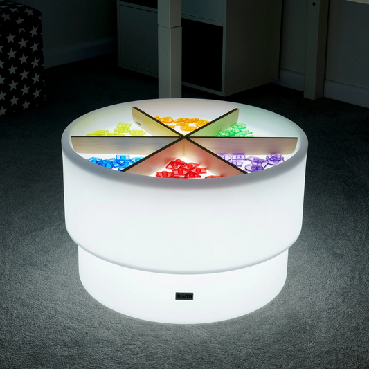 Round Discovery table with wooden dividers and loose parts