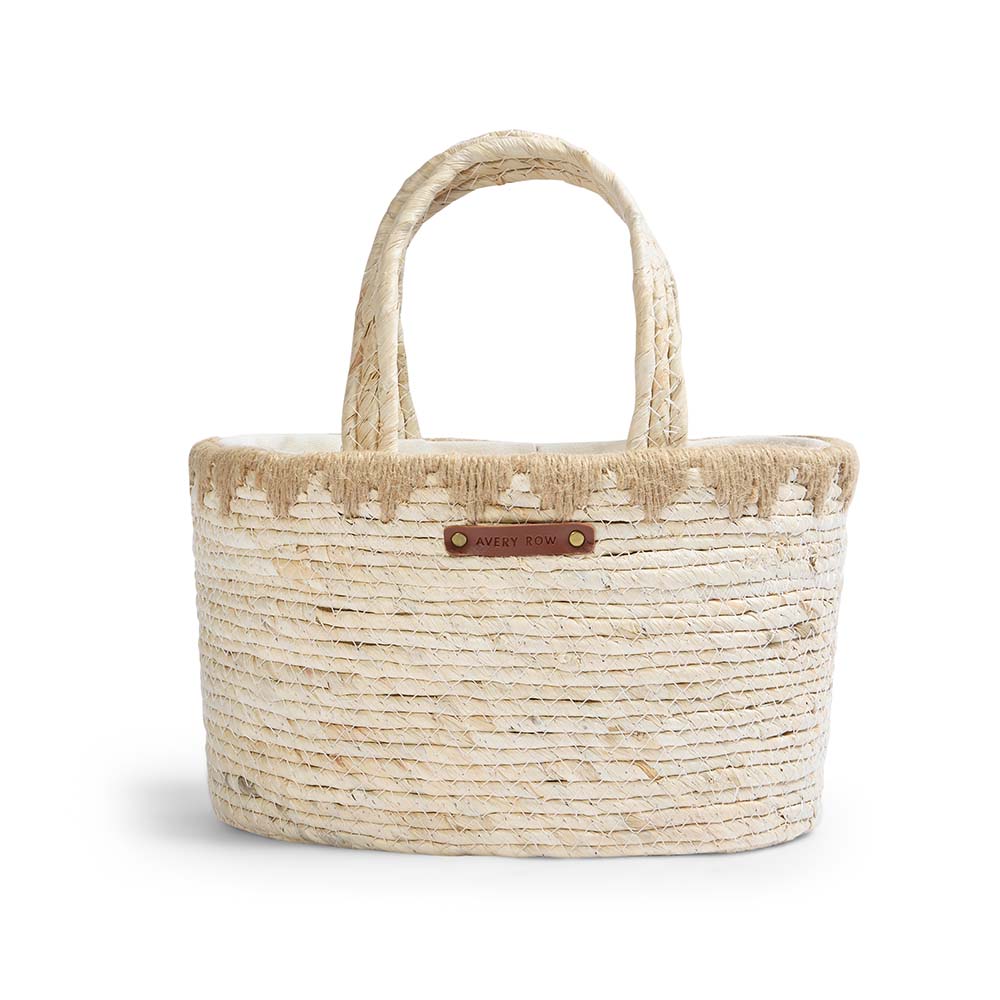 Woven handbag with a visible brand label on a white background
