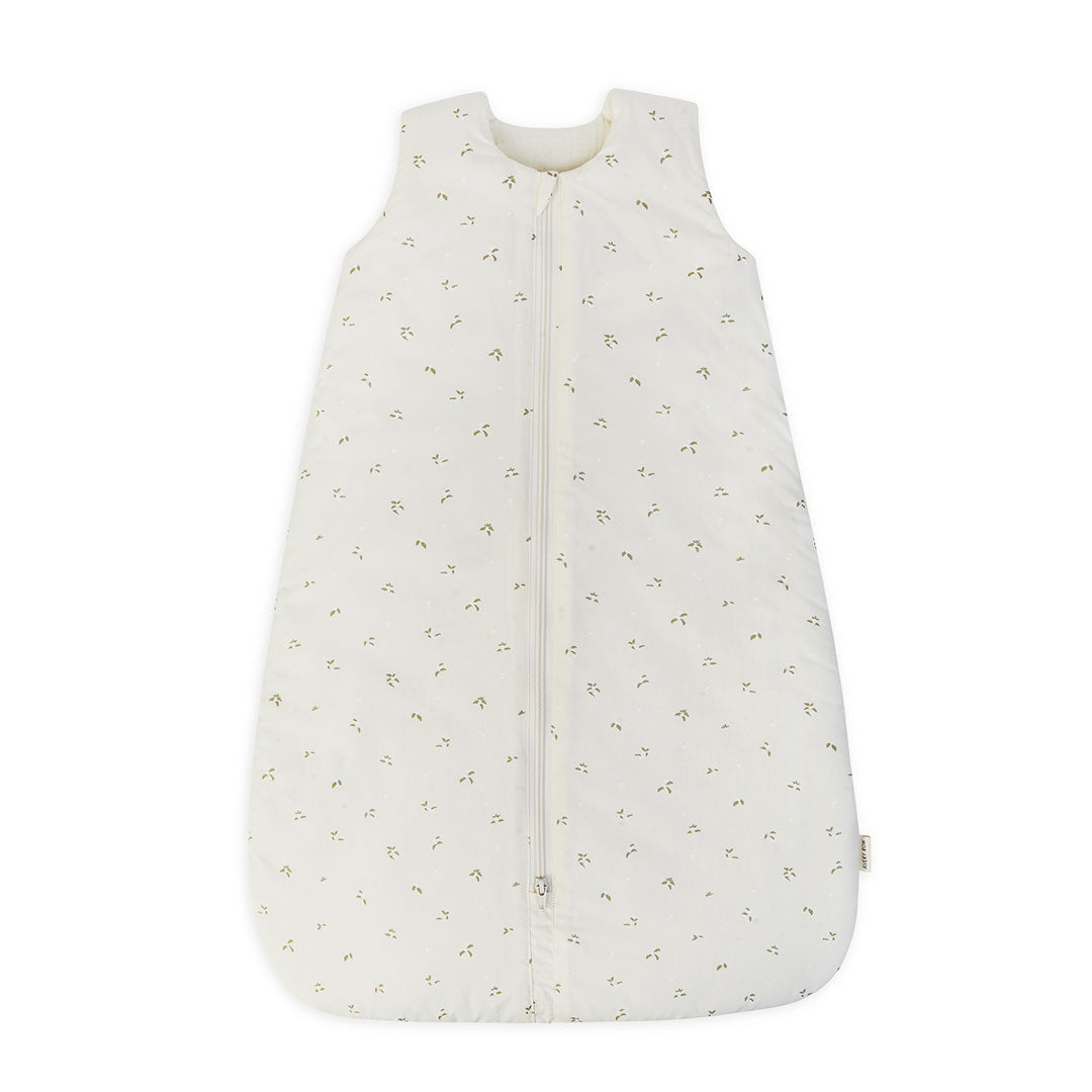 White baby sleeping bag with subtle pattern on a white background