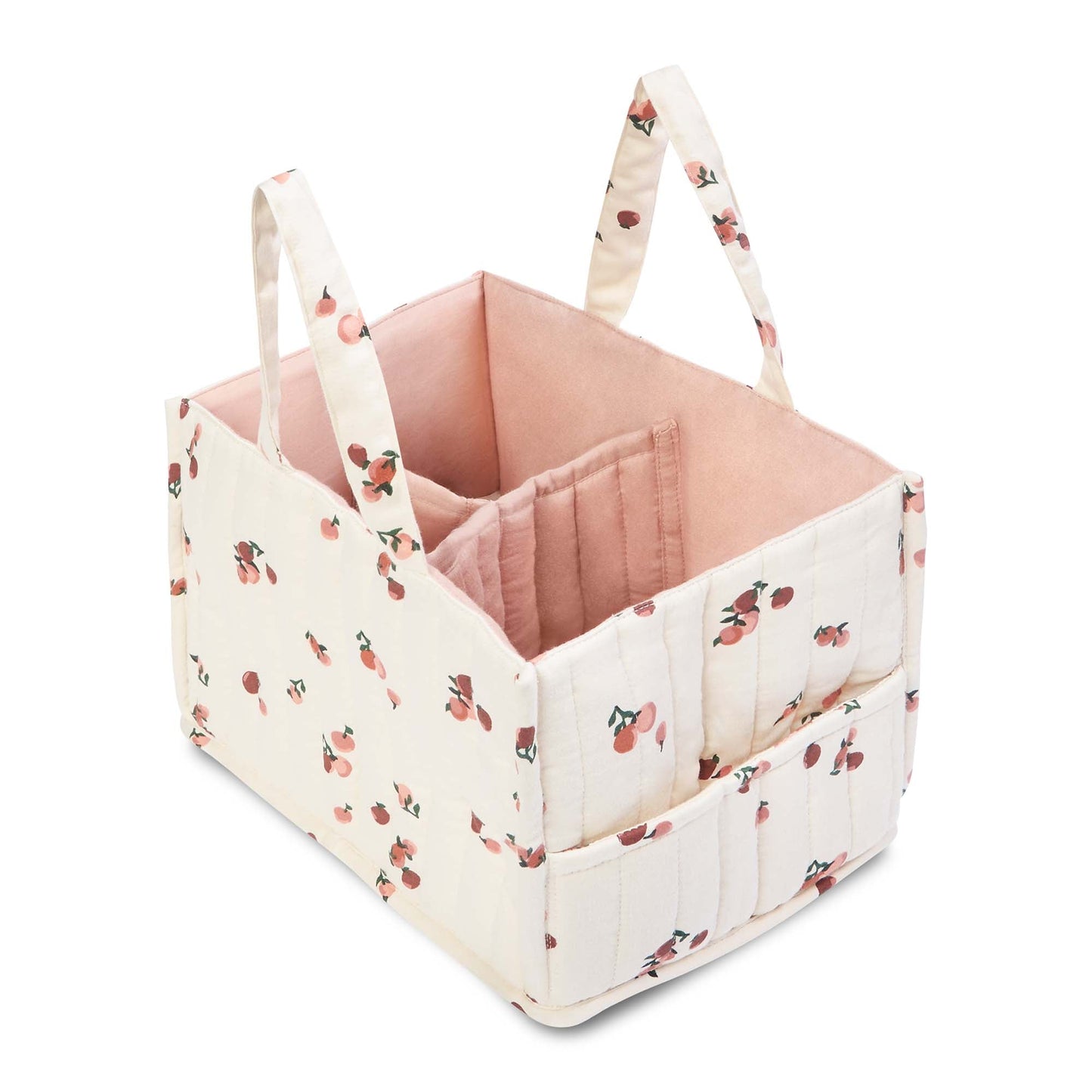 Pink baby crib with floral patterned sides and handles on a white background
