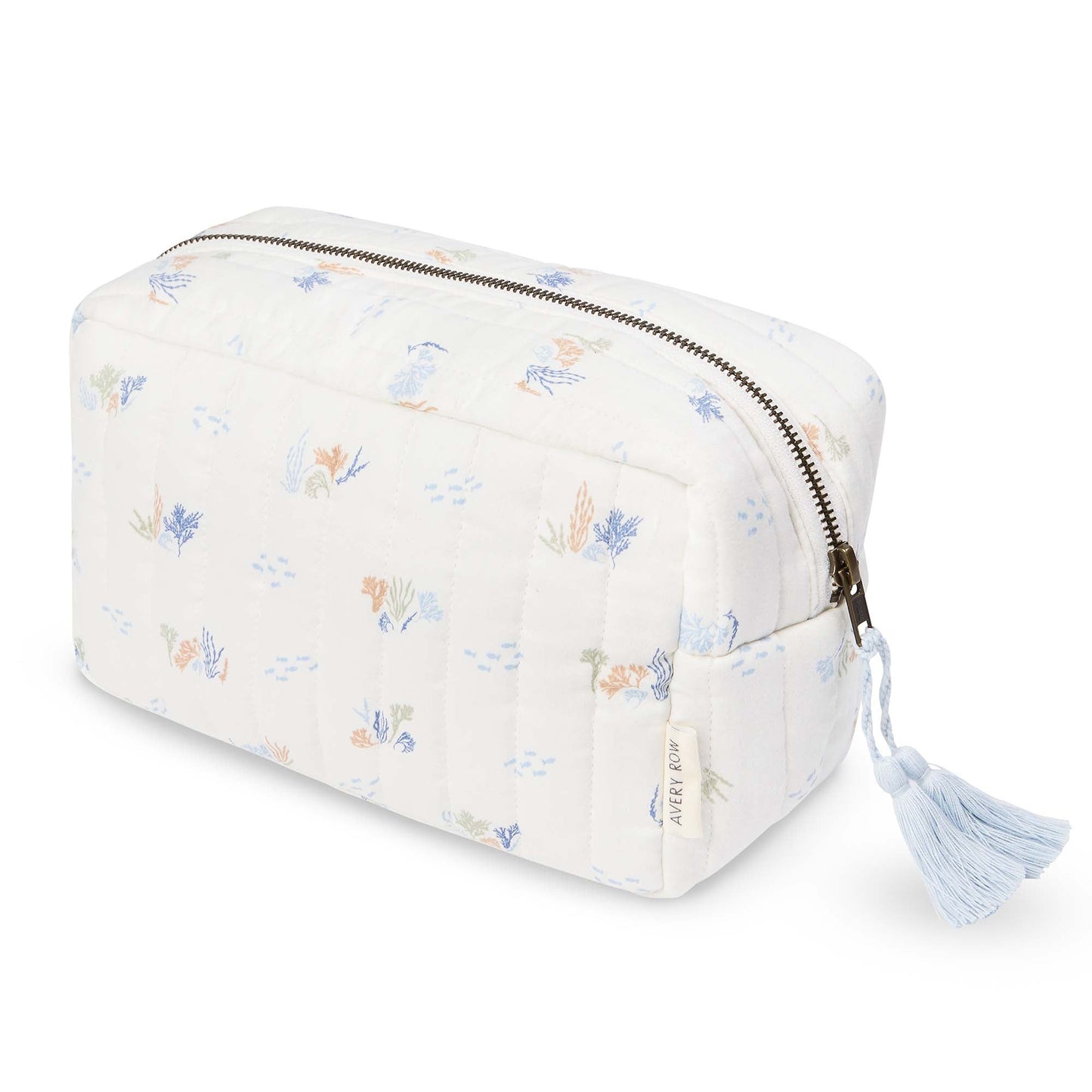 White cosmetic bag with floral pattern and tassel on a white background