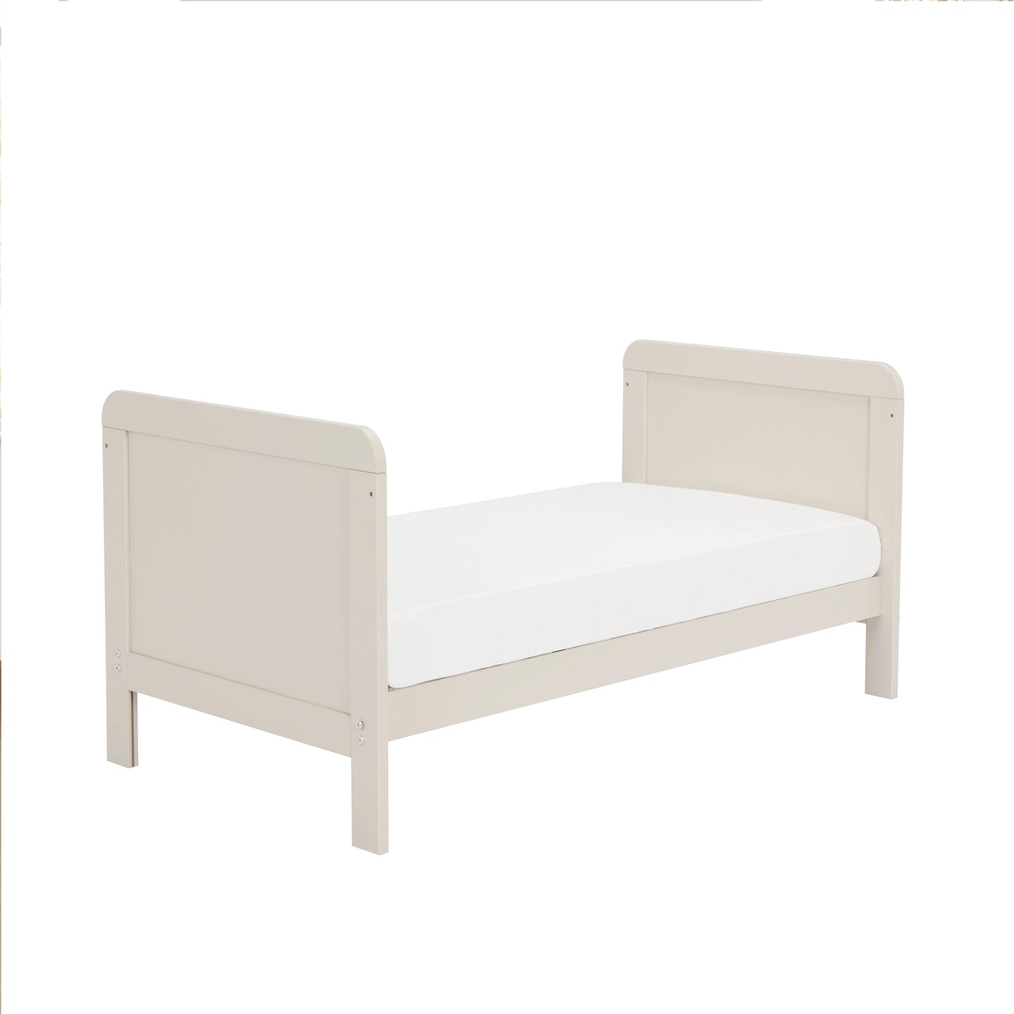 Cashmere children's bed with a white mattress on a white background
