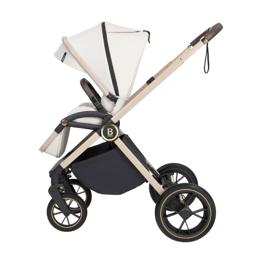 Baby stroller with beige canopy and black base on a white background
