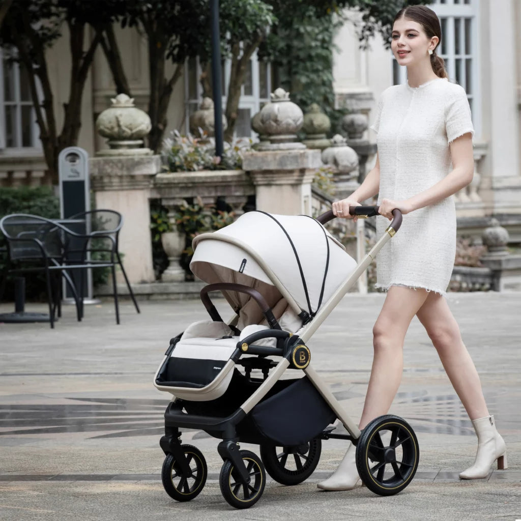 Woman pushing a baby stroller in an outdoor setting