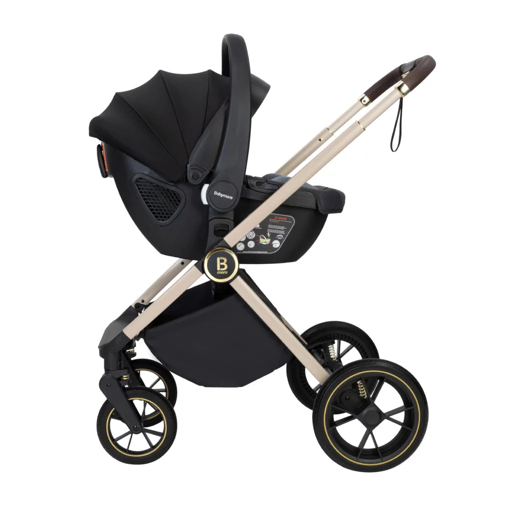 Black and beige baby stroller with car seat on a white background