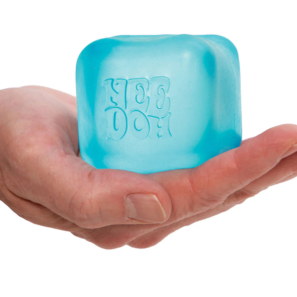 Blue ice cube-shaped object with 'YEE DOH' text held in a hand against a white background