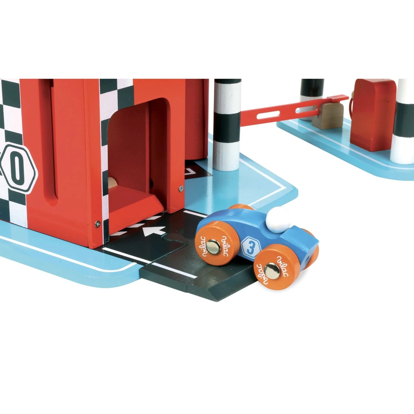 Toy race car on a track with a red starting gate and checkered flag.