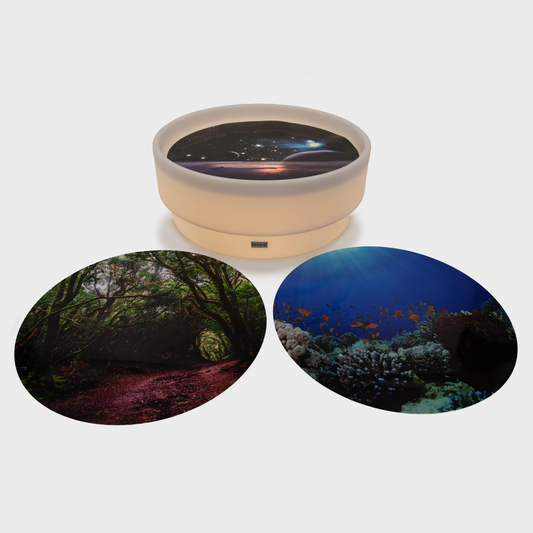round low sensory light table with 3 play mats with different backgrounds