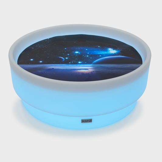 Round sensory mood table light with space-themed design on a white background