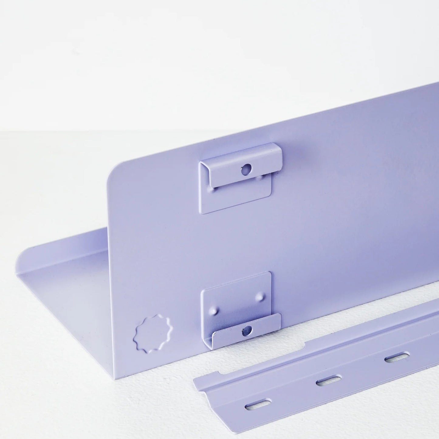 Purple metal bracket on a white background
