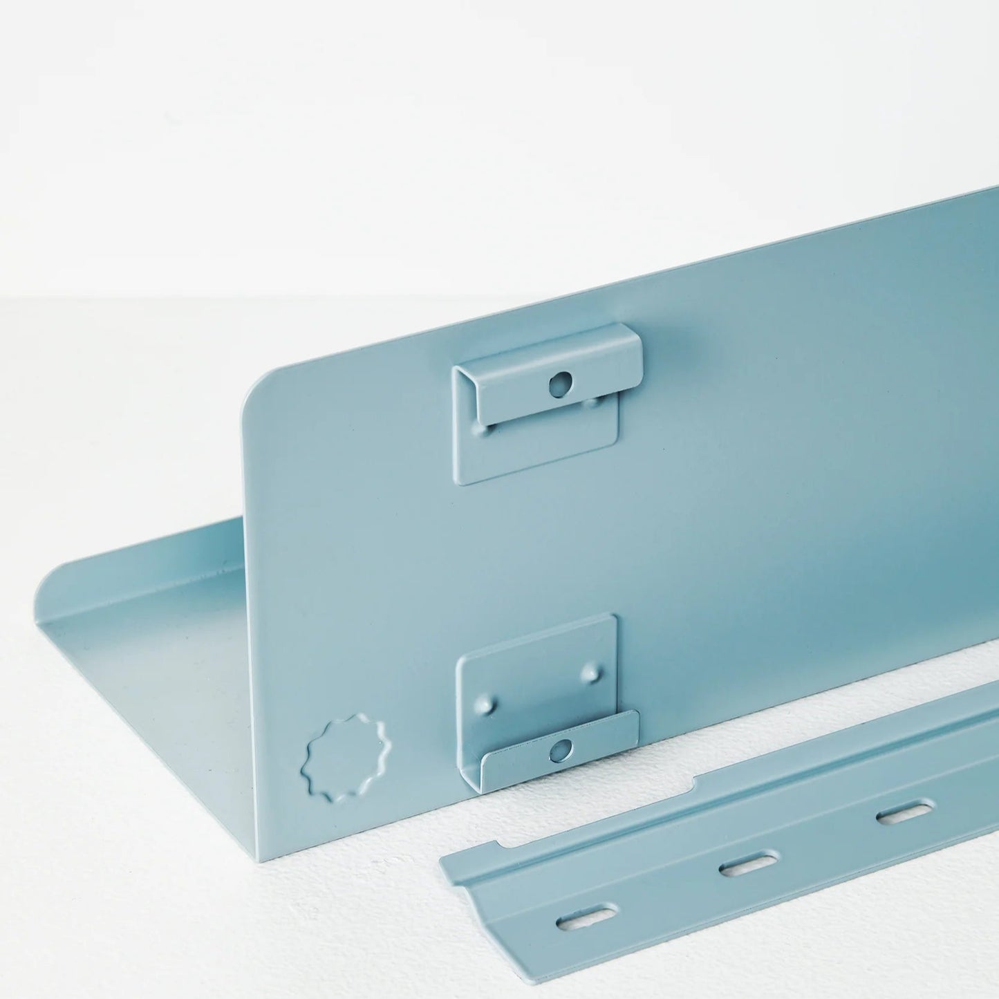 Back of light blue shelf