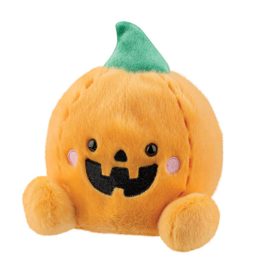Plush toy pumpkin with a green top on a white background