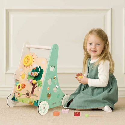 Child playing with a wooden toy in a bright room