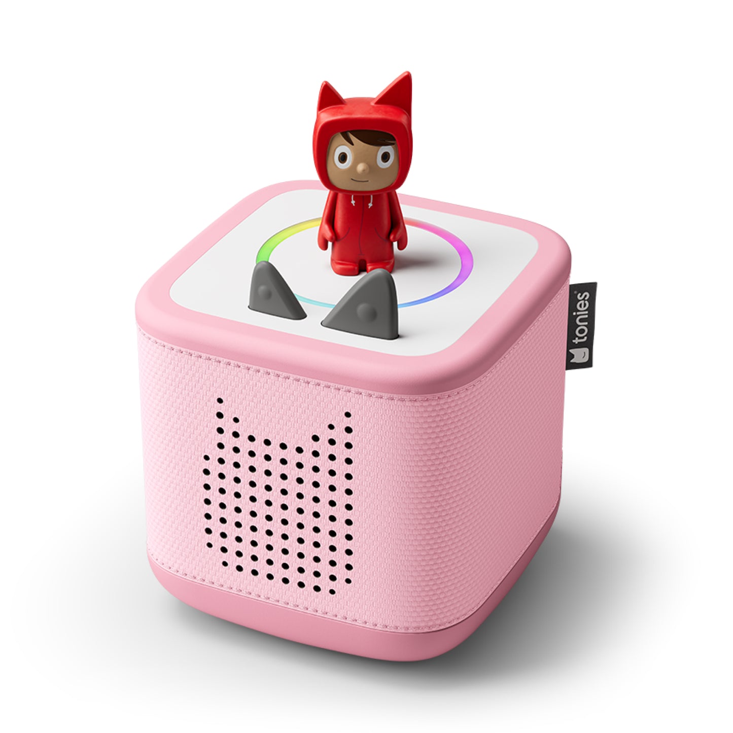 Pink toy speaker with a small figure on top on a white background