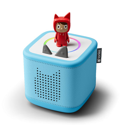 Blue toy speaker with a red hooded figure on a white background