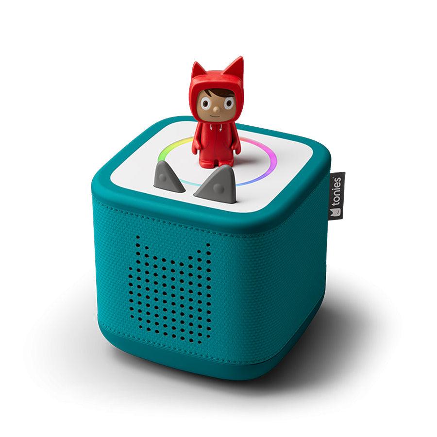 Teal toy box with a red character on top against a white background