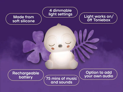 White silicone night light with purple leaves on a purple background, featuring text about its features.