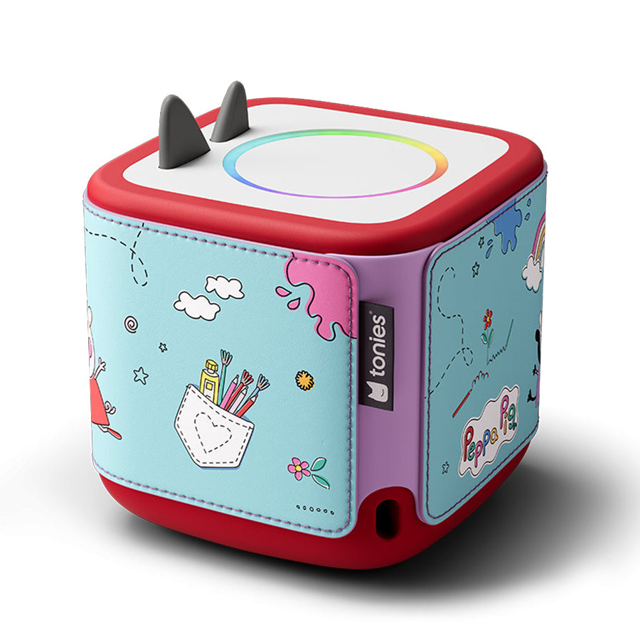 Colorful toy box with cartoon designs on a white background