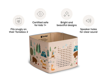 Cardboard box with forest design and features listed on a white background