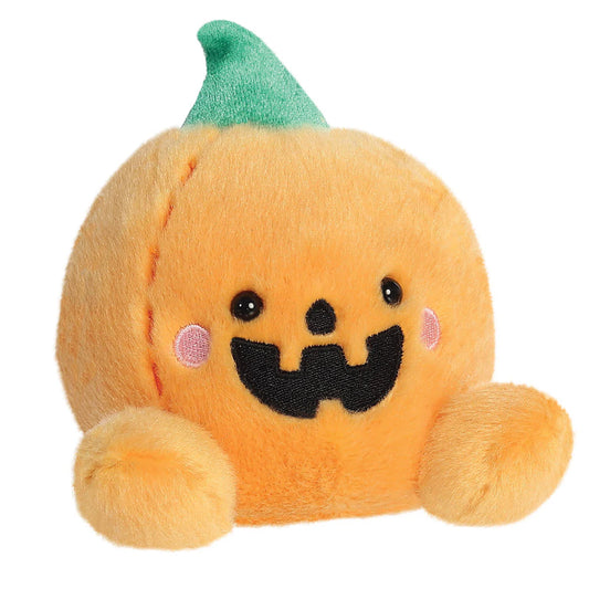 Plush toy pumpkin with a green top on a white background