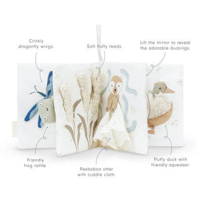 Children's soft toy set with various features labeled on a white background