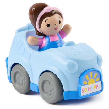 A light blue plastic toy car with a smiling cartoon girl figure sitting inside. The figure has brown hair in a pink headband and blue overalls, with gray wheels.