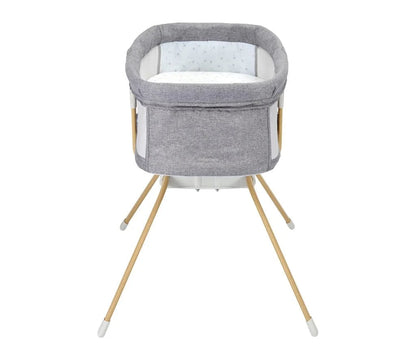 Gray baby bassinet with wooden legs on a white background