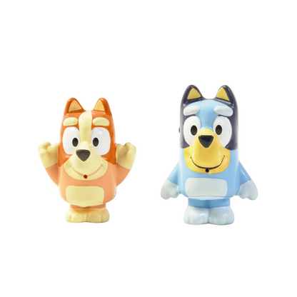 Two cartoon character figurines on a white background