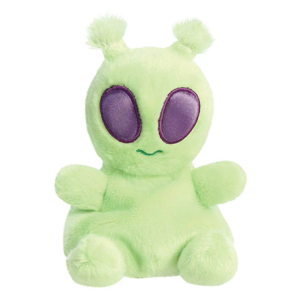 Green plush toy with purple eyes on a white background