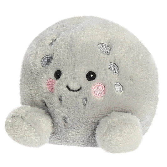 Plush toy resembling a gray seal with a smiling face on a white background