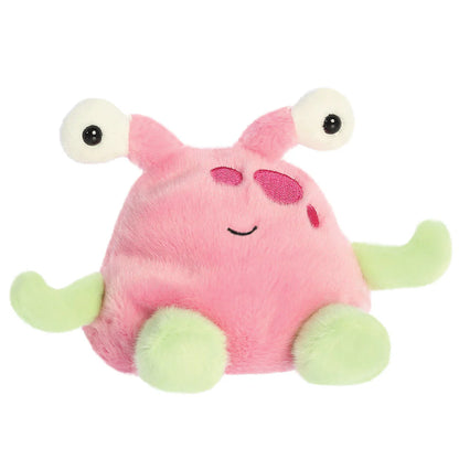 Pink plush toy with googly eyes and green legs on a white background