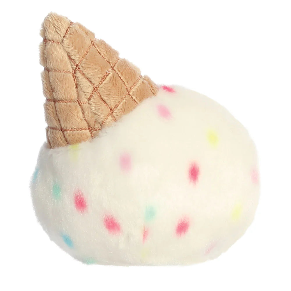 Toy resembling an ice cream cone with a textured waffle cone and colorful sprinkles on a white background