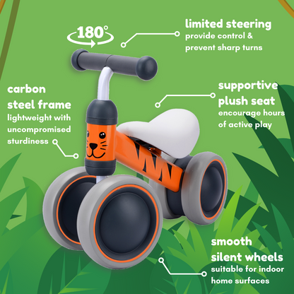 Children's balance bike with features highlighted on a green background