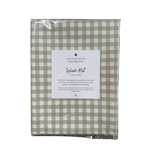 Packaged green and white checkered splash mat with Ralphie Bear branding on a white background