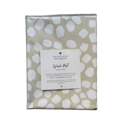Ralphie Bear splash mat with white abstract pattern on a beige background