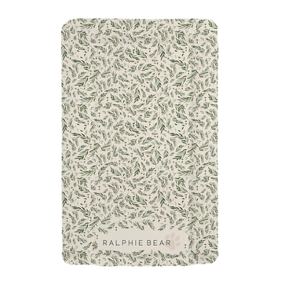 Notebook with leaf pattern and 'Ralphie Bear' branding on a white background