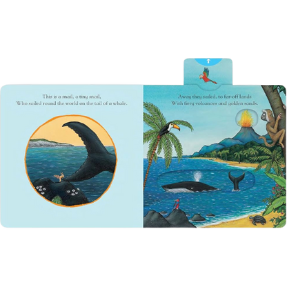 Illustrated book page with whale and tropical scene