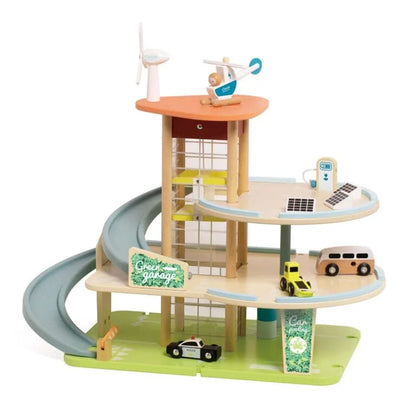 Wooden toy town with buildings, cars, and a slide on a white background