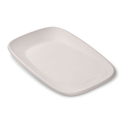 Rectangular beige plate on a white background