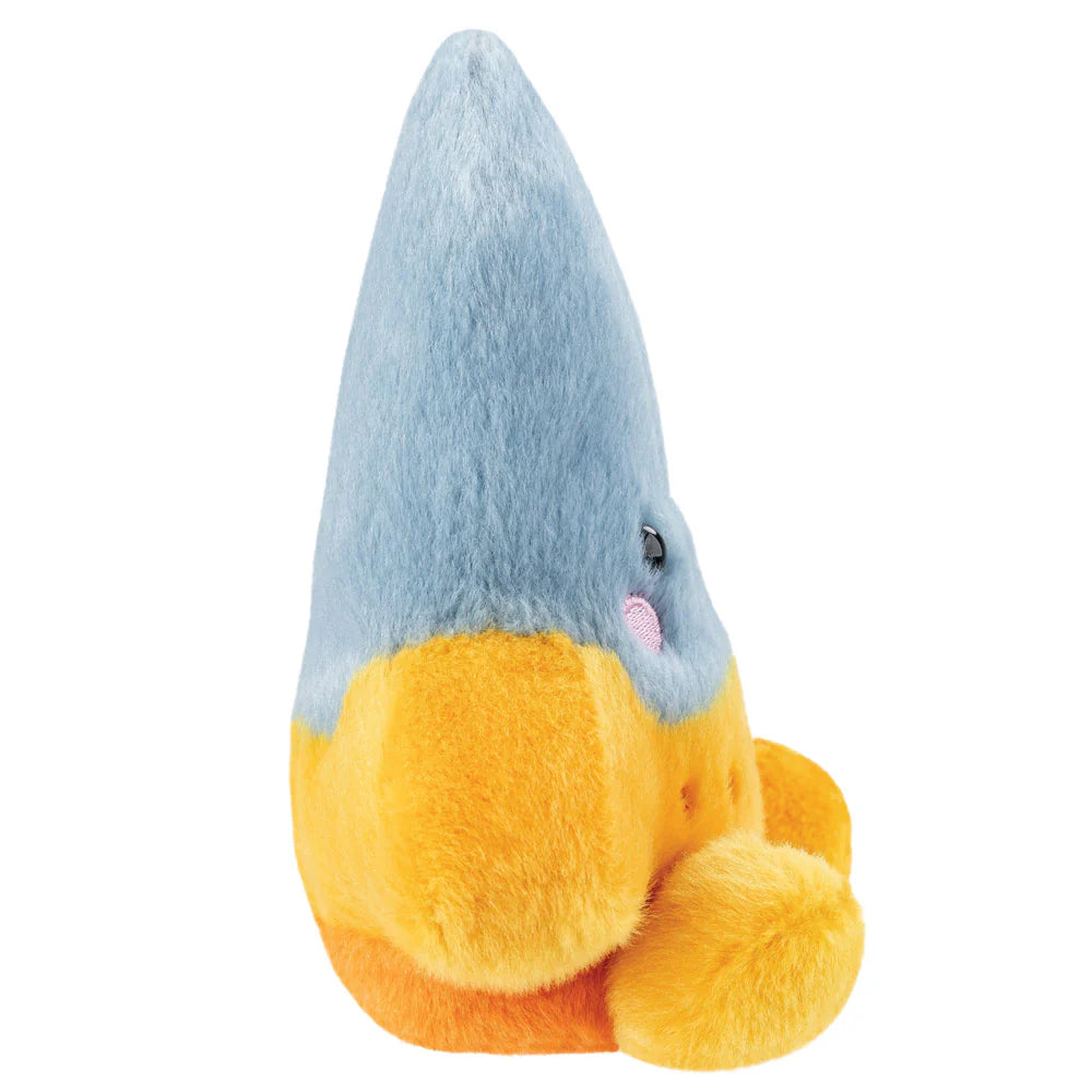 Plush toy shark with a blue top and yellow bottom on a white background