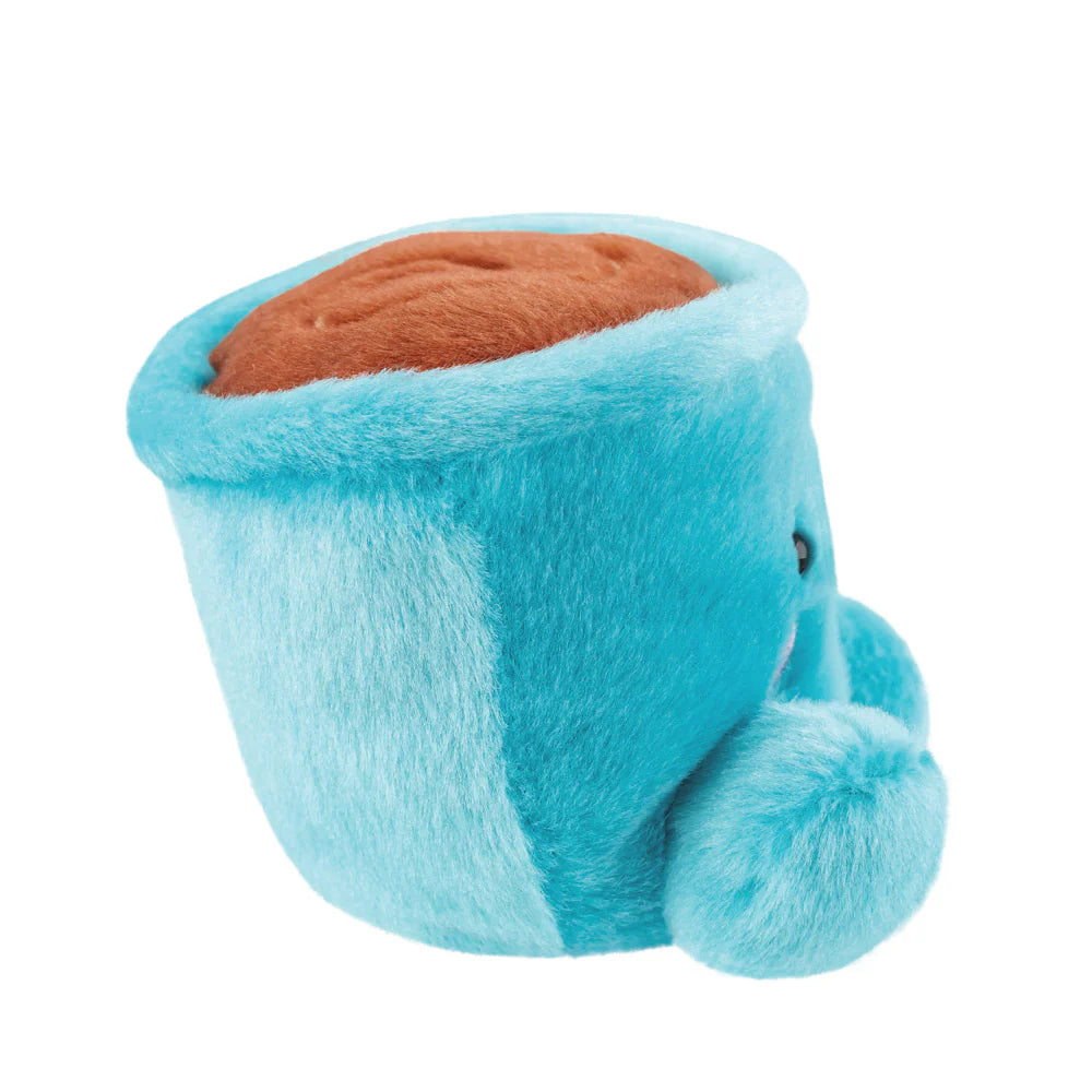 Blue plush toy resembling a cup with a brown interior on a white background