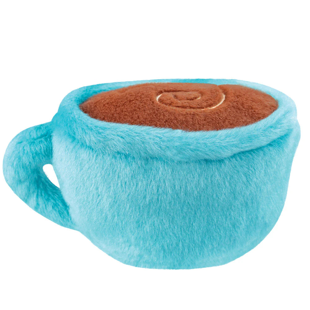 Blue plush toy shaped like a cup with brown interior on a white background