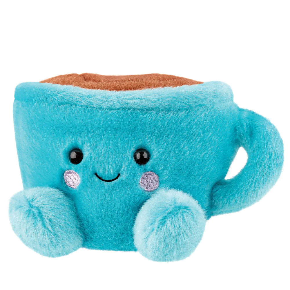 Plush toy shaped like a blue mug with a smiling face on a white background