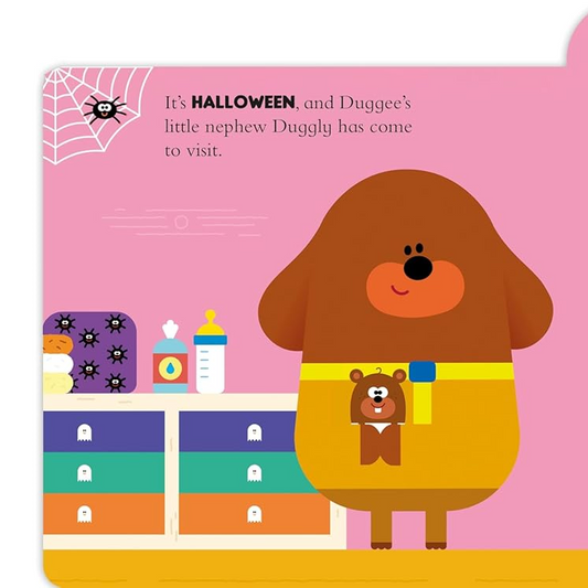 Illustration of a children's book page with a pink background, featuring a dog character and other animals celebrating Halloween.