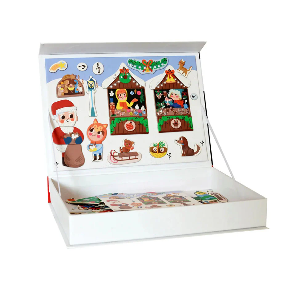 A white advent calendar box shown open, with a decorated inner lid featuring Christmas-themed illustrations and a tray of small paper tabs or stickers inside the base, photographed on a clean white background.